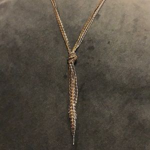 Long gold, silver, grey knot necklace